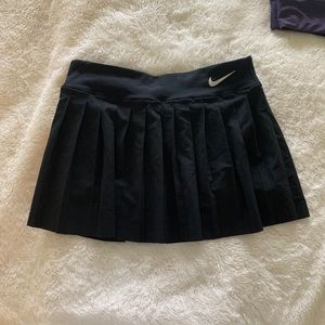 Black pleated Nike skort